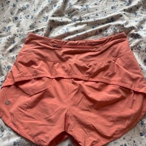Orange lululemon shorts